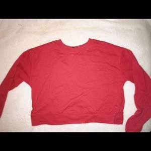 Red cropped sweatshirt.